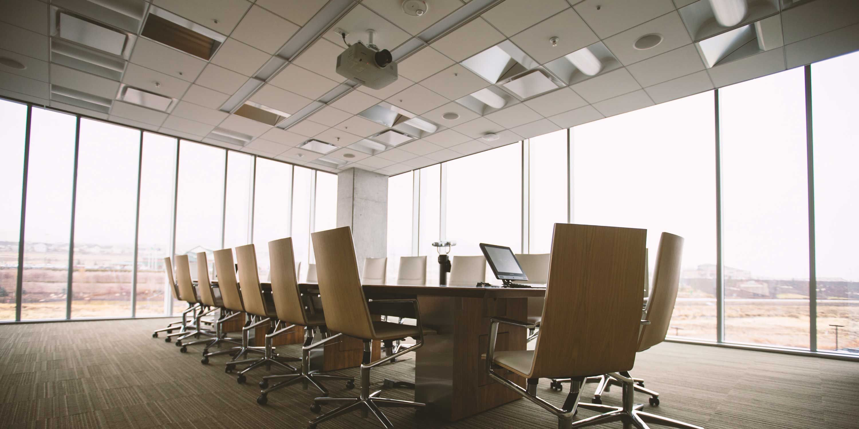 conference room, wood chairs, large windows
