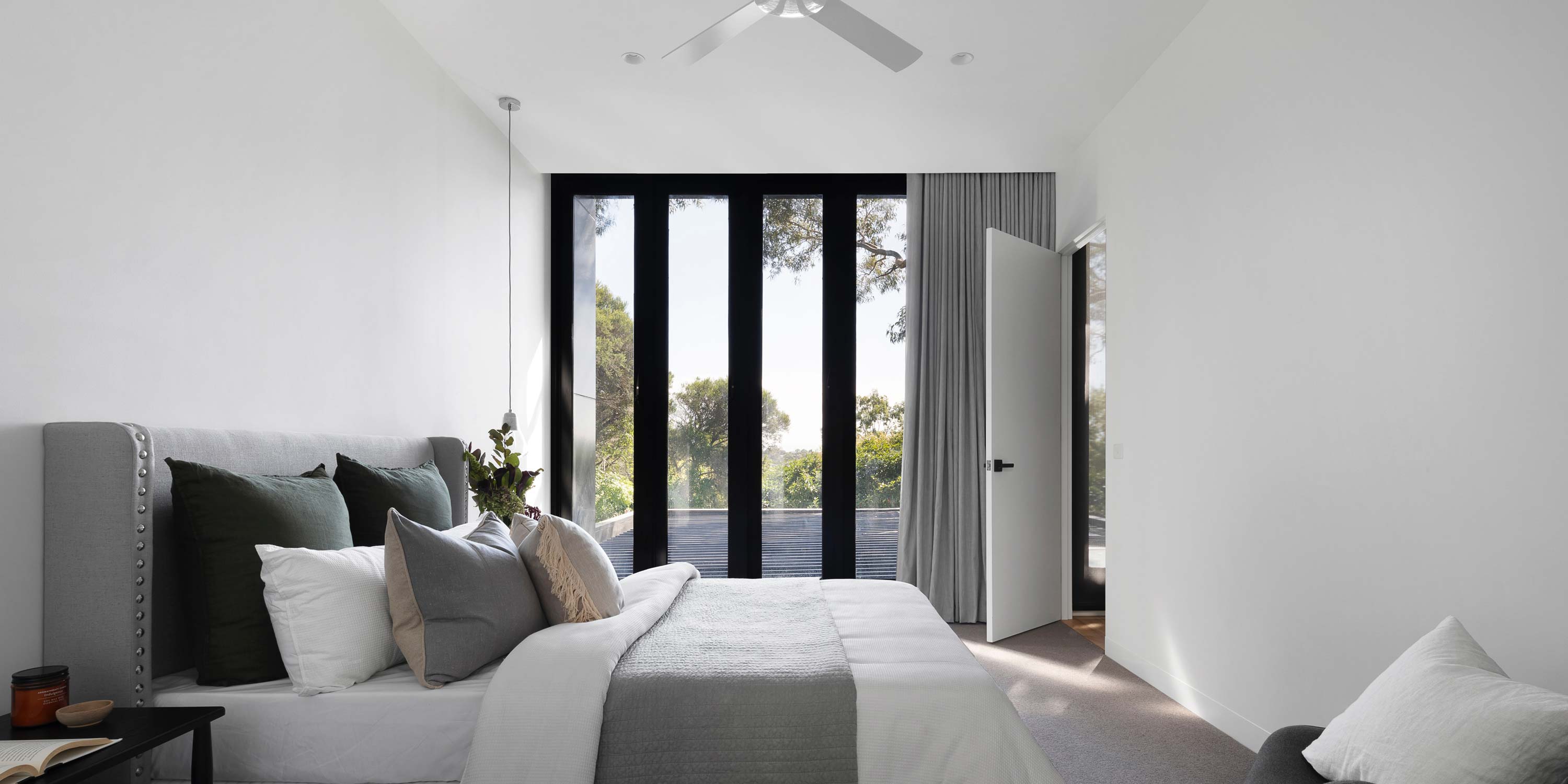 bedroom, grey, black doors, clean