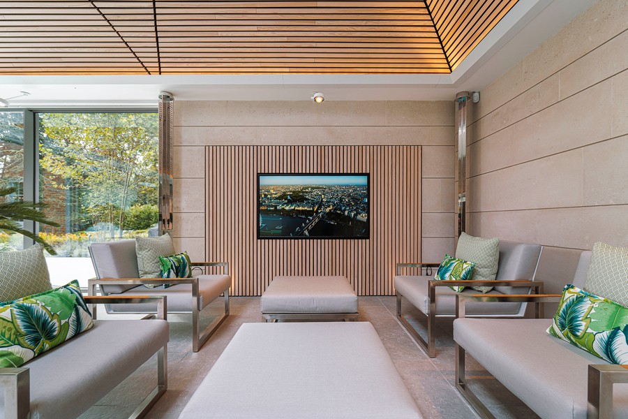 A casual living space with a TV using Future Automation’s integration technology.