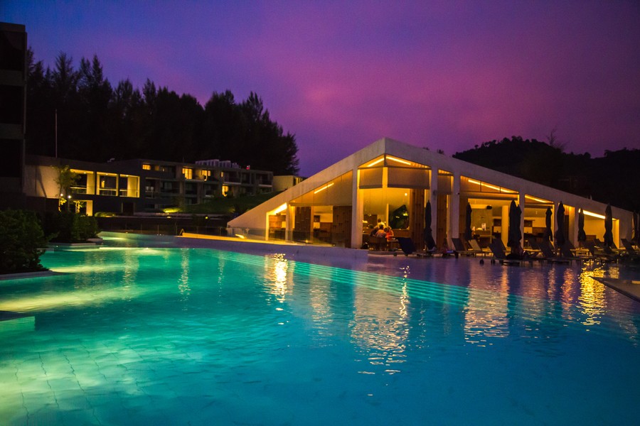 Image is of lighting fixtures on the patio ceiling of a modern home.