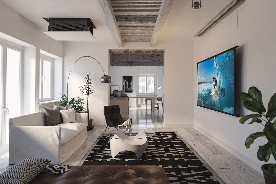 Brightly lit white media room looks into the adjacent kitchen with sophisticated furnishings and flat-panel television.