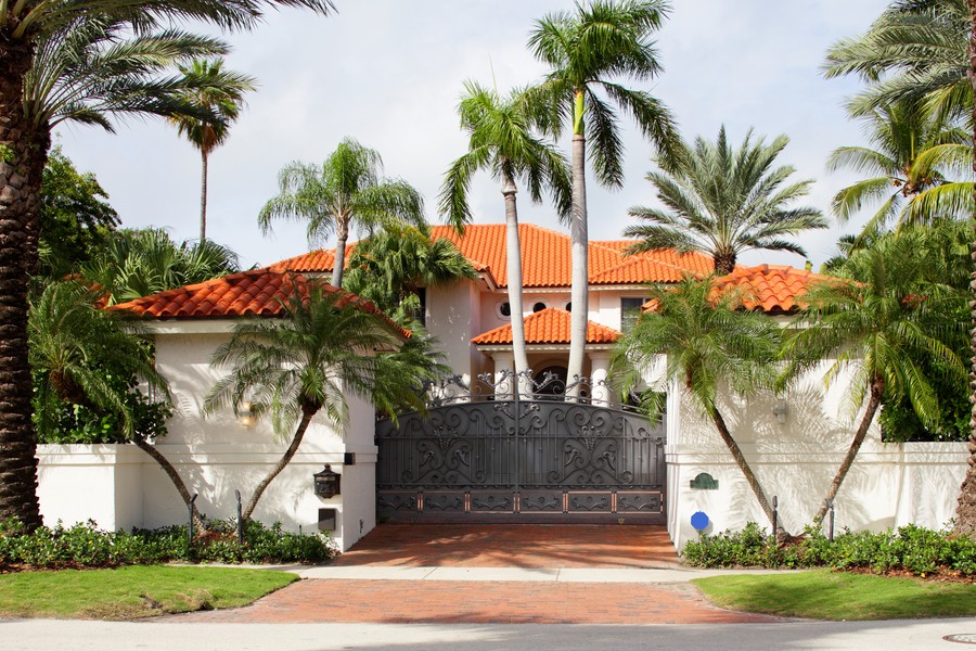 Exterior view of a home’s gated entry.