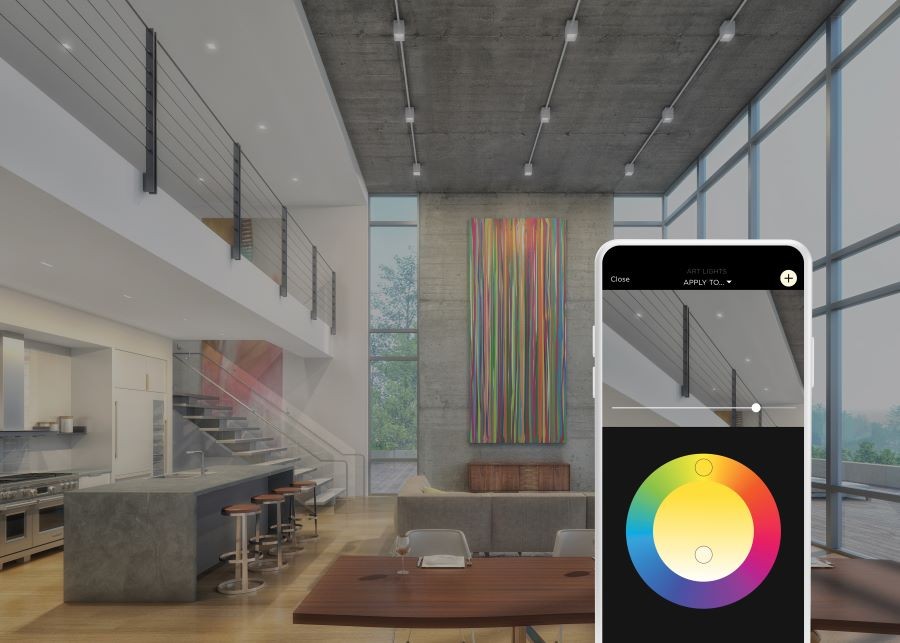A modern home with floor-to-ceiling windows. An overlayed smartphone with the Savant App displays the color wheel.